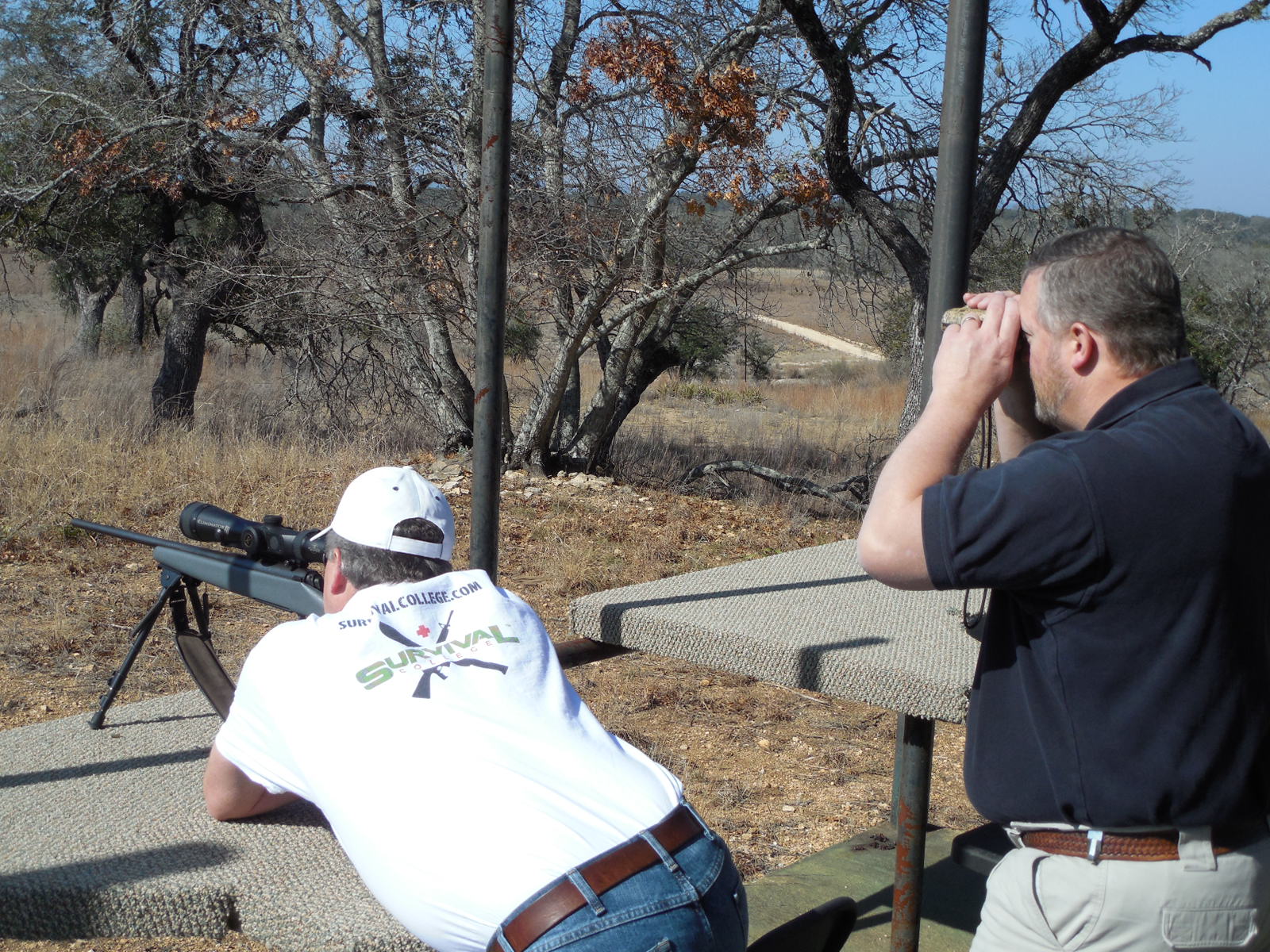 Ken Lewis formally with National Protective Services Institute also known as NPSI Training and currently with Prevent Prepare Protect Training and Consulting instructing a student during a Basic Rifle Instructor Class.
